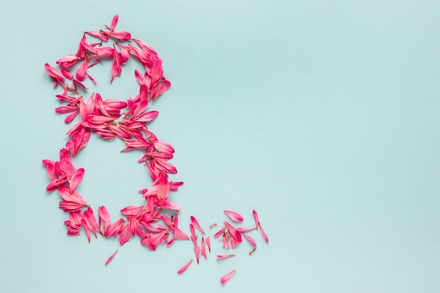 Top view of number made of petals for women's day