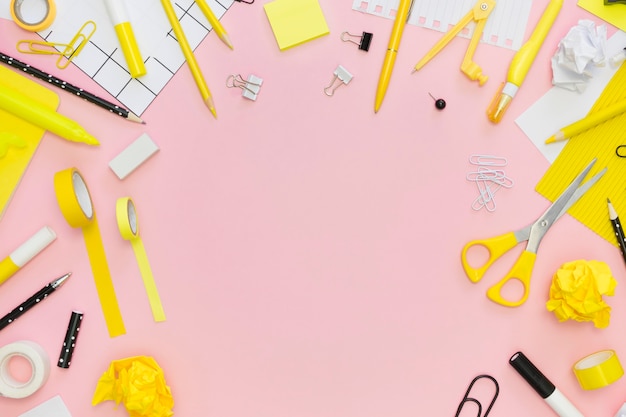 Top view of office stationery with tape and scissors