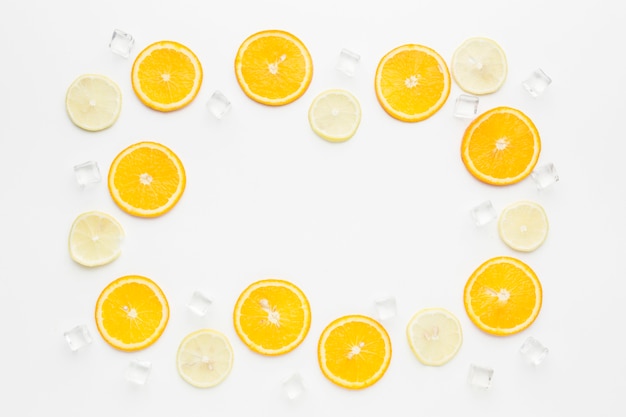 Free Photo top view of orange slices frame concept