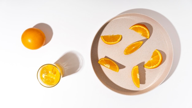 Top view orange slices on plate