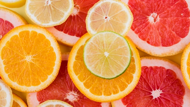 Free photo top view organic orange slices