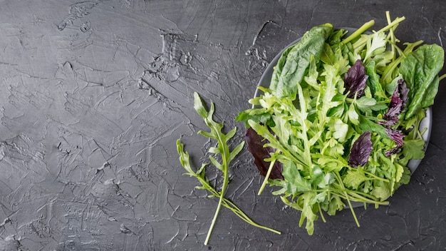 Top view organic salad on a plate