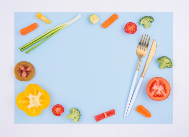 Top view organic vegetables with cutlery