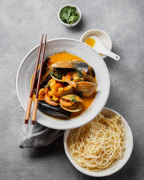 Top view oysters and noodles arrangement