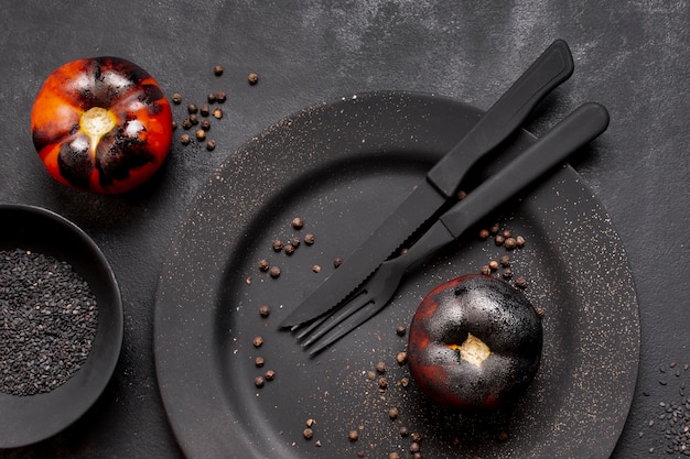 Top view painted black baked tomatoes top view