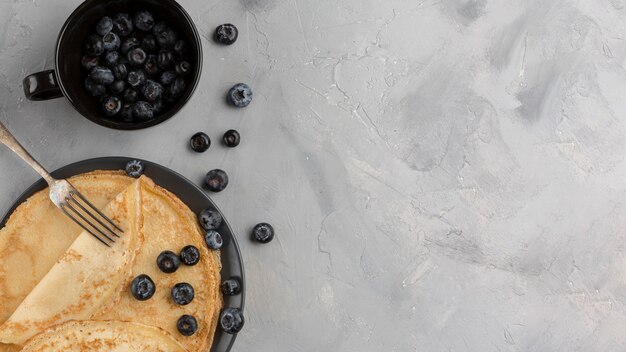 Top view pancake with stucco background