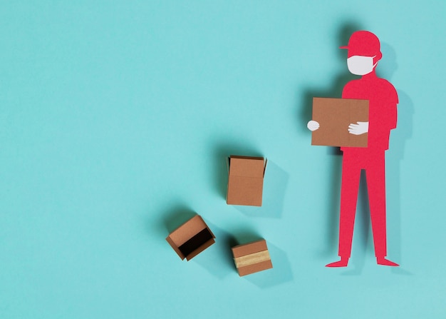 Top view paper delivery man holding box