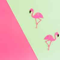 Free photo top view of paper flamingos