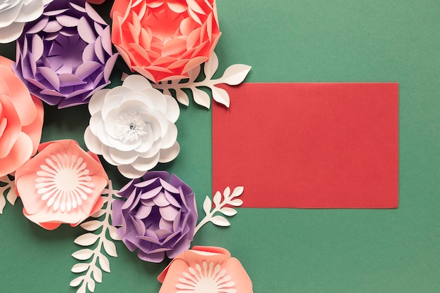 Top view of paper flowers with card for women's day