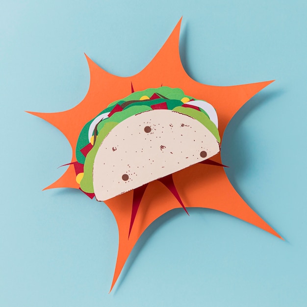 Free Photo top view paper taco on blue background