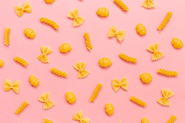 Top view of pasta arrangement on plain background