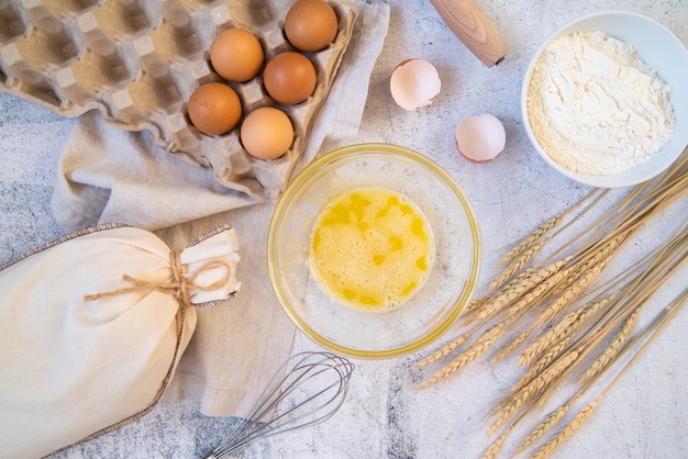 Top view pasta ingredients with kitchen supplies