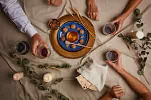 Free photo top view of people having a feast for the first day of passover seder