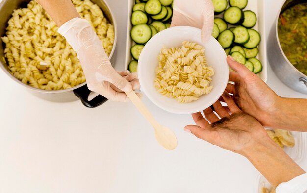 Top view of person receiving donated food