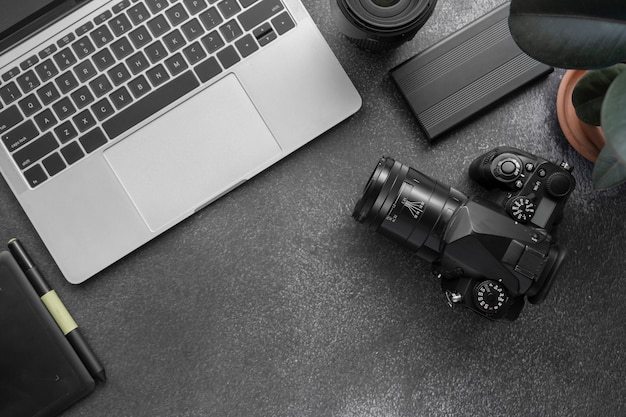 Free Photo top view photo camera indoors still life