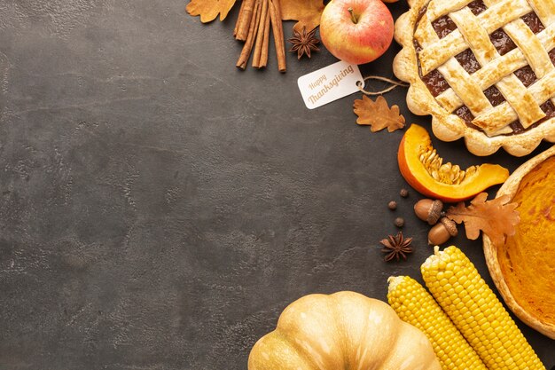 Top view pie and apples on stucco background