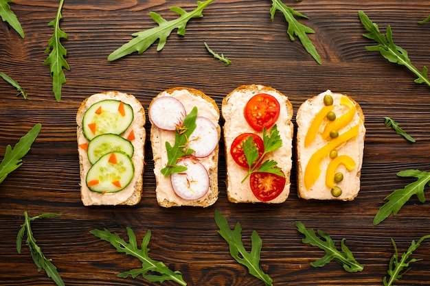 Top view pieces of bread with veggies 