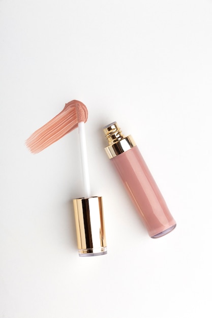 Free photo top view pink lipgloss shade