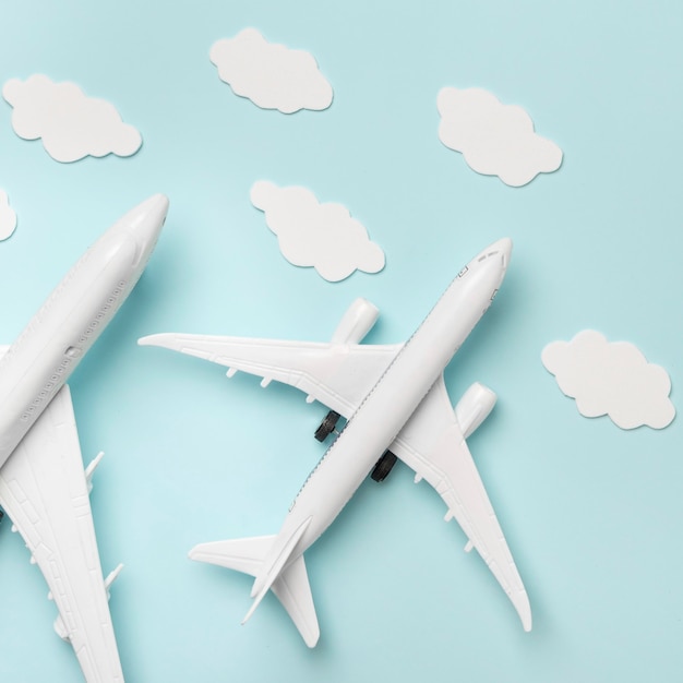 Top view plane toys on blue background