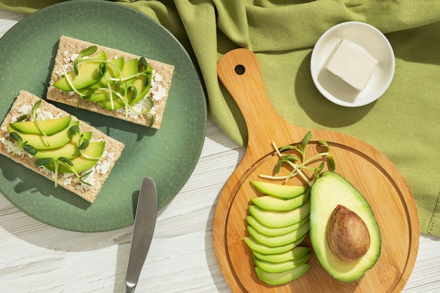 Top view of plate with keto diet food and avocado