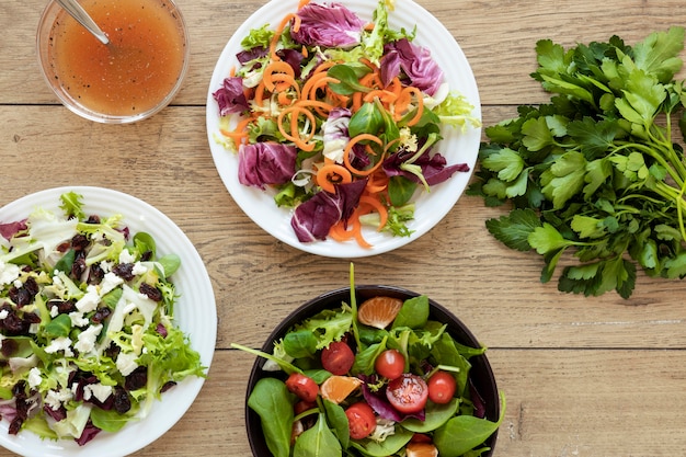 Free photo top view plate with salad on table