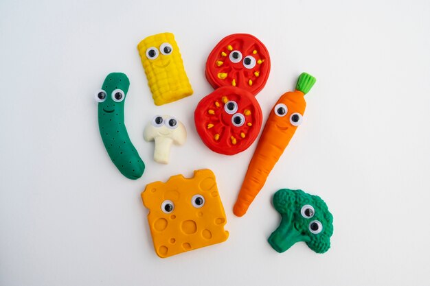 Top view play dough background with vegetables