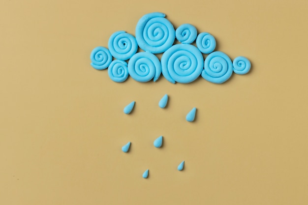 Free Photo top view play dough raining cloud