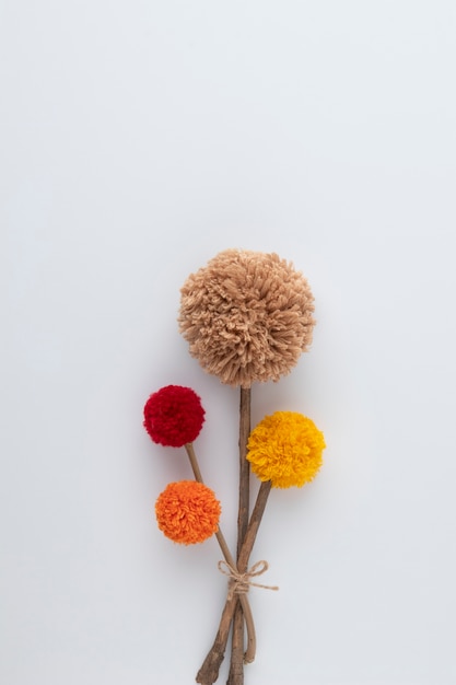 Free photo top view pom poms background