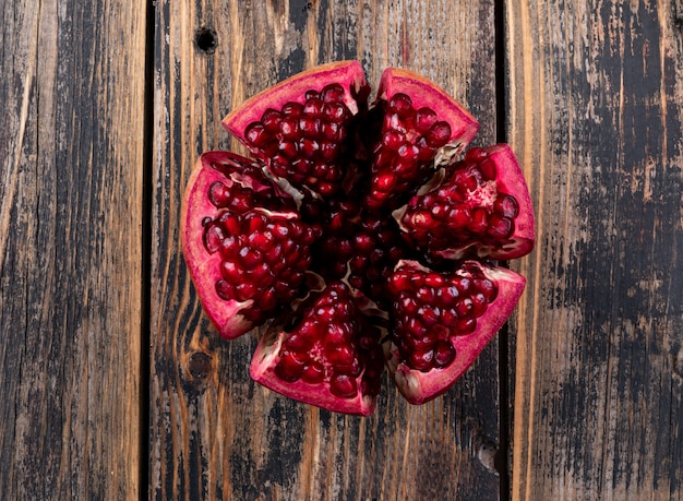 top view pomegranate on wooden table