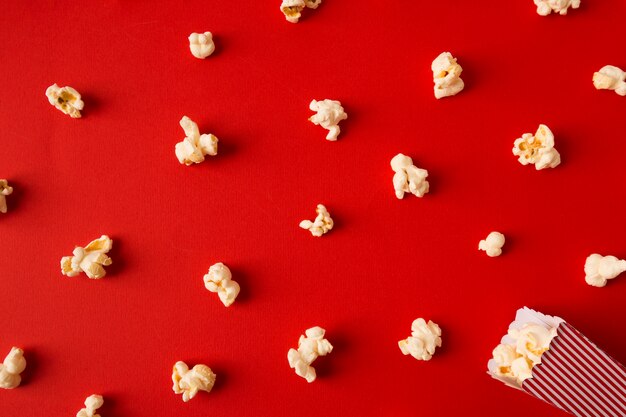 Top view popcorn assortment on red background