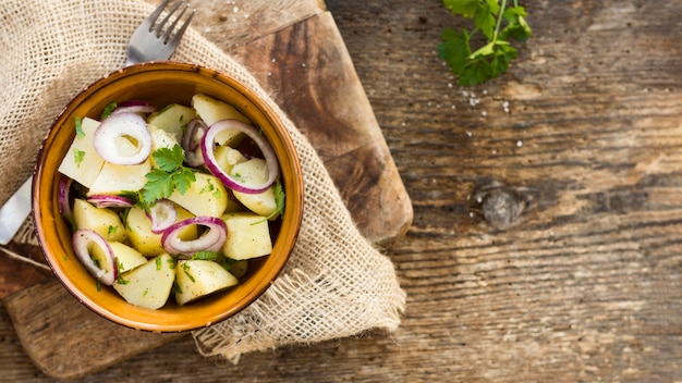 Top view potato salad frame with copy-space