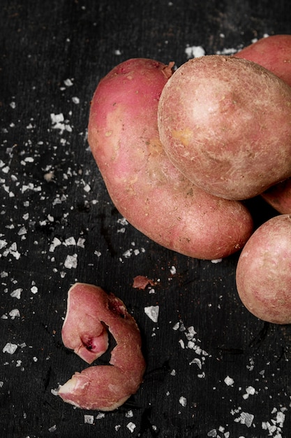 Top view of potatoes with salt