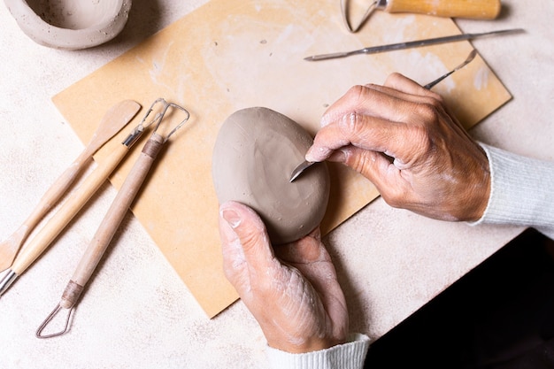 Free photo top view pottery process