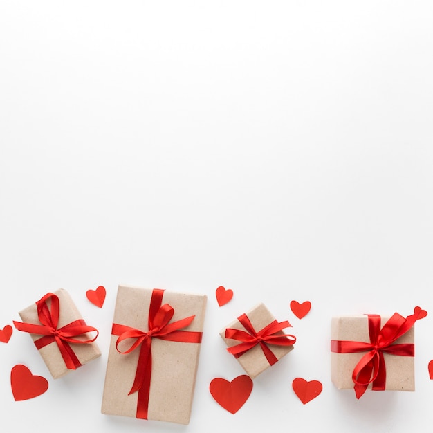 Top view of presents with copy space and hearts