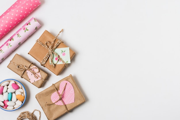 Free Photo top view of presents with wrapping paper and candy