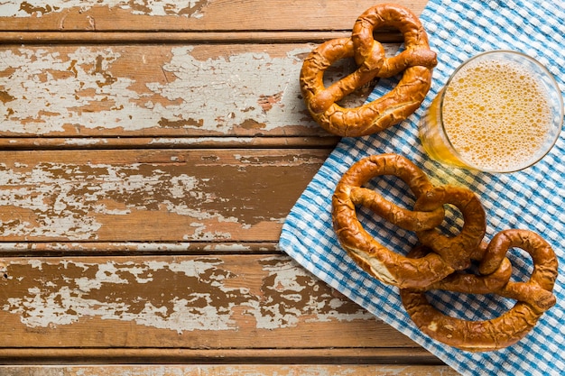 Top view of pretzels with beer