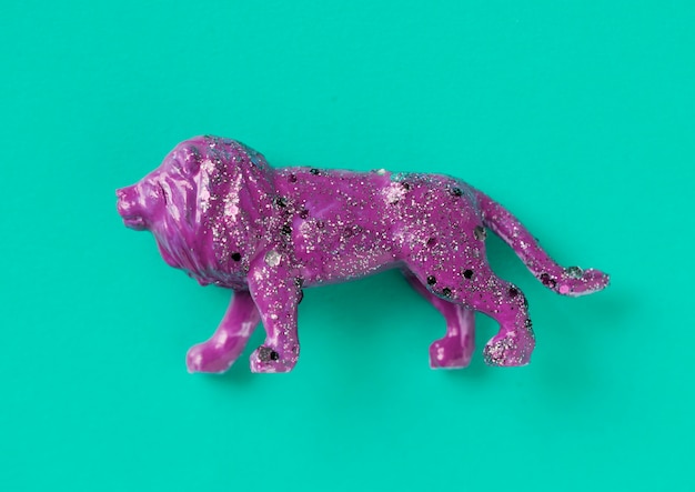 Free photo top view of purple lion with glitter