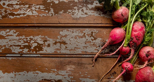 Free photo top view of radishes with copy space