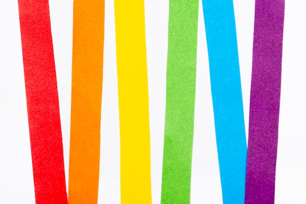 Free Photo top view rainbow colored paper