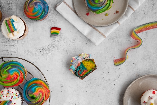 Top view rainbow cupcakes still life