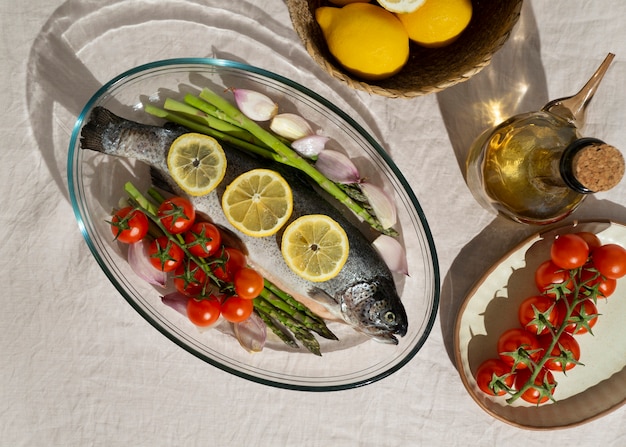 Free photo top view raw trout still life