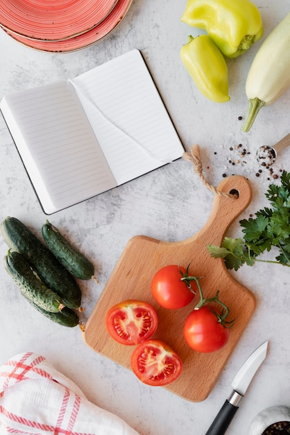 Top view on recipe book still life concept