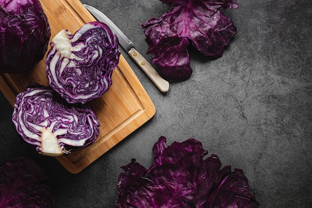 Free Photo top view red cabbage on cutting board