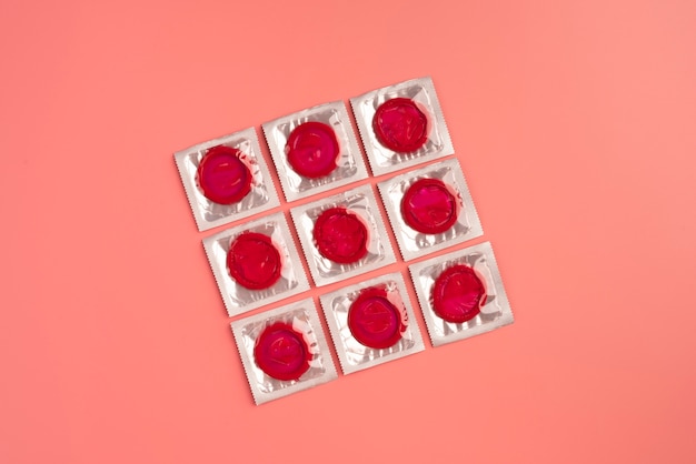 Top view red condoms arrangement