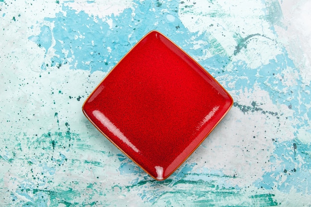 Free Photo top view red plate square formed empty on light blue background