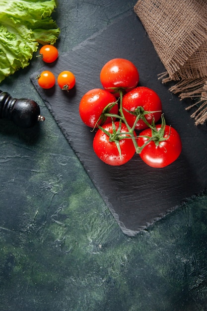 Free Photo top view red tomatoes on dark background ripe grow meal food tree color salad photo dinner