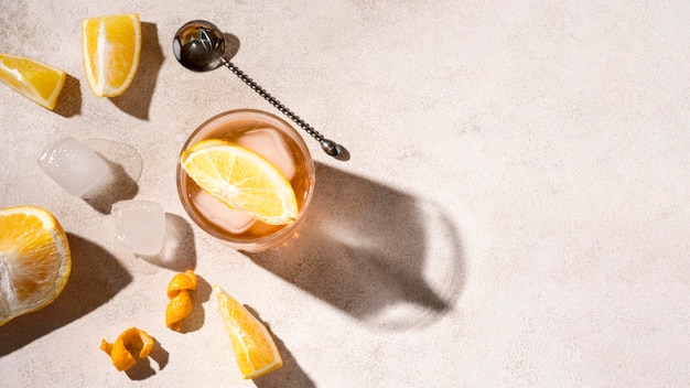 Top view refreshing alcoholic drink with ice cubes