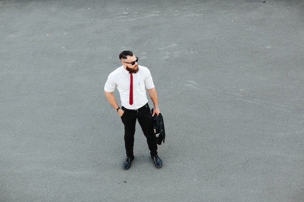 Free Photo top view of relaxed businessman with briefcase