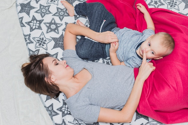 Top view of relaxed mother and son