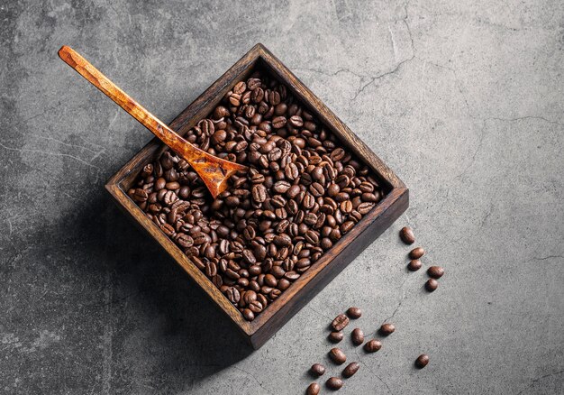 Top view of roasted coffee beans in square container